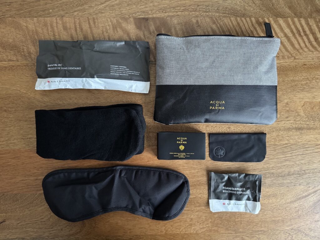Base kit contents — toothbrush, toothpaste, socks, earplugs