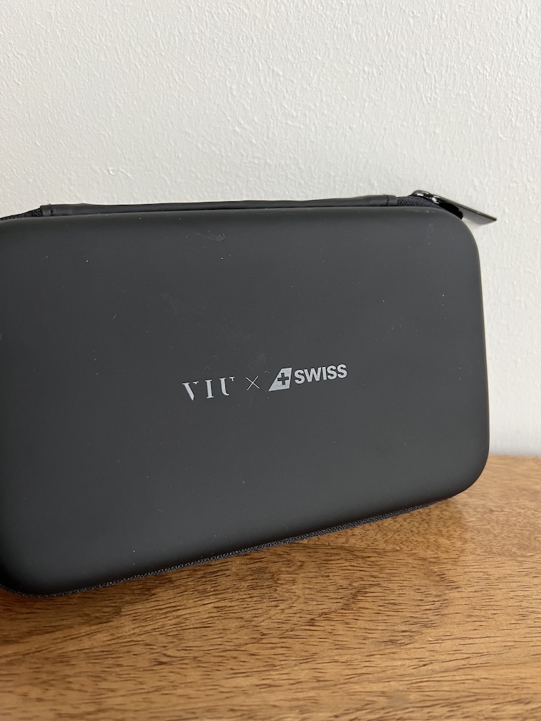 SWISS Senses amenity pouch — the complete base kit laid out
