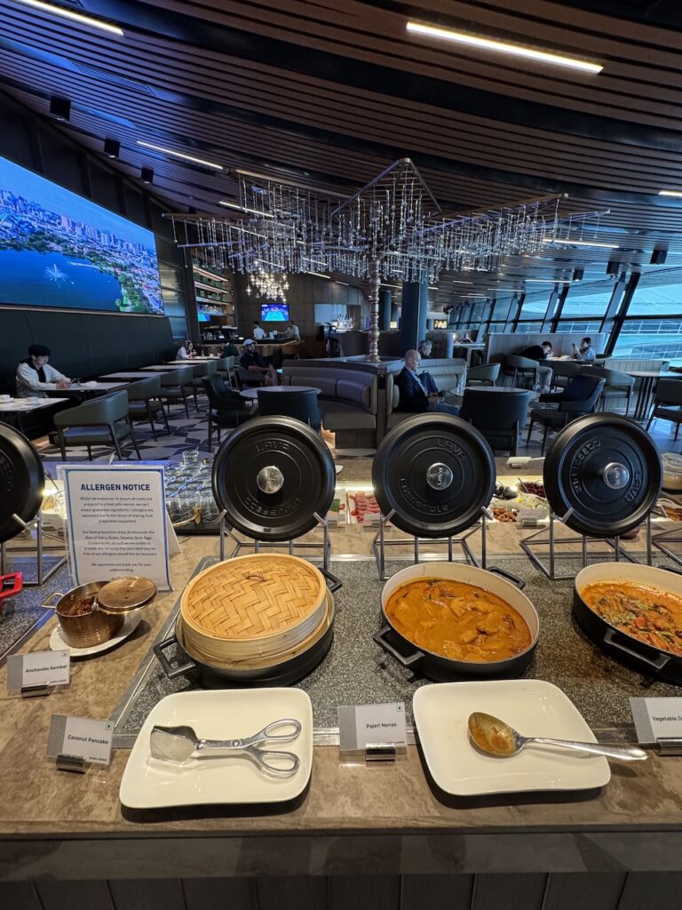 Buffet counter — cold selections, salads, and Asian pastries