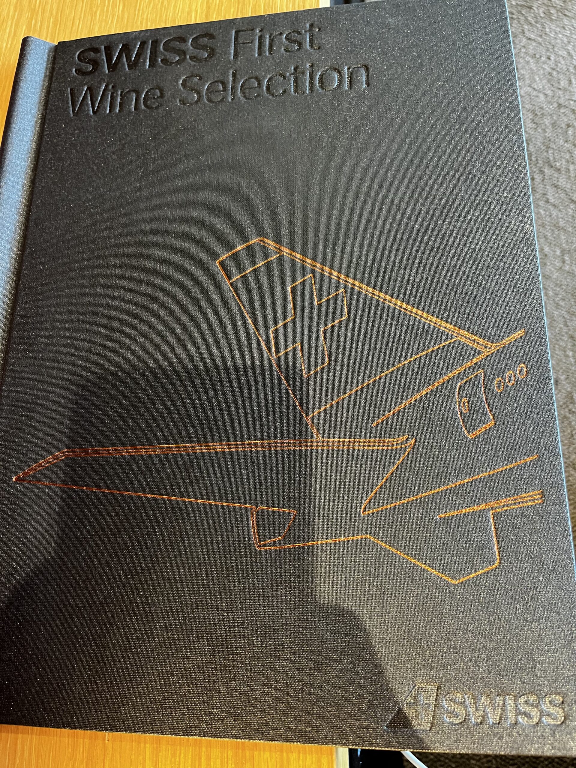 Swiss First Class Lounge Zürich — main seating area with floor-to-ceiling windows overlooking the E-apron